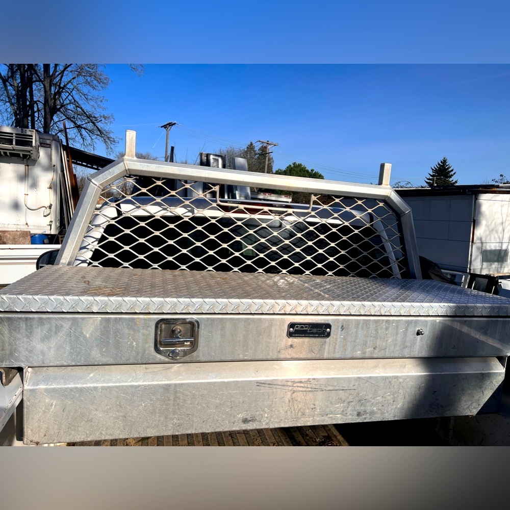 Pickup truck body tool box